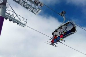 Skiers on ski lift at Kopaonik